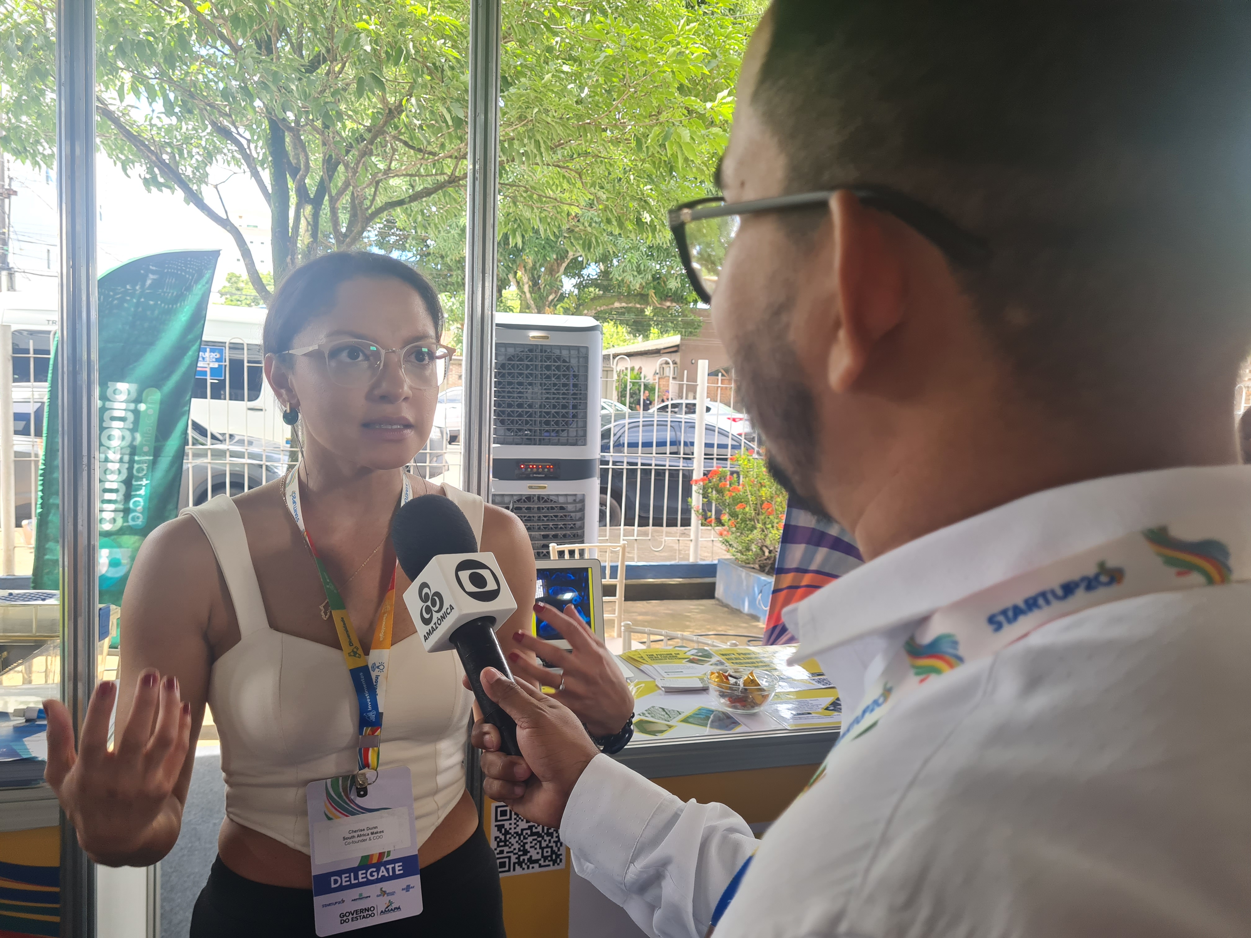 Dr. Cherise Dunn giving a media interview at the G20 Startup20 event in Brazil